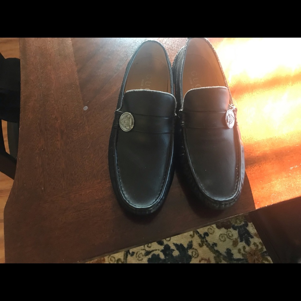 Black Gucci loafers